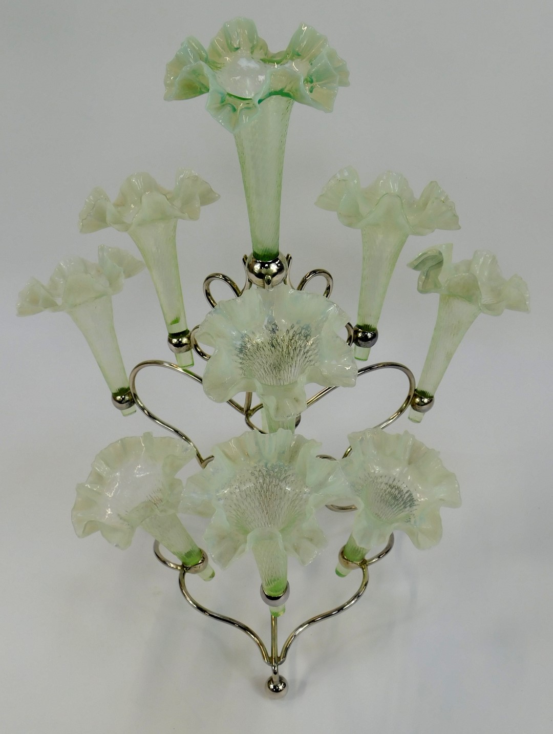A late Victorian silver plated nine branch epergne, each glass shade of trumpet form with handkerchi - Image 2 of 5