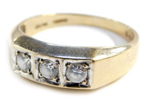 A 9ct gold gentleman's three stone diamond ring, set with three old cut diamonds, each approx 0.12ct