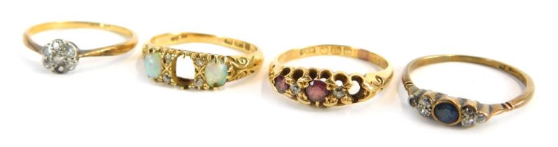 Four various 18ct gold dress rings, all lacking stones, total weight 10g all in.