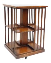 A Victorian mahogany revolving bookcase, of two tier, four sectional form, raised on castors, 81cm h