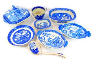 A Staffordshire blue and white Willow pattern square tureen and cover, and other Willow pattern pott