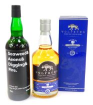 A bottle of Wolfburn Single Malt Scotch Whisky, together with a bottle of Seaweed & Aeons & Digging