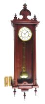 A Rapport of London mahogany cased wall clock, the white enamel circular dial bearing Roman numerals