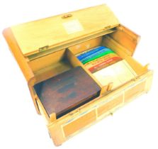 A 20thC oak Butterfly Brand salesman's box, with a hinged compartment to the top, the front with a h