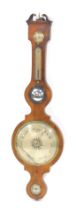 A 19thC mahogany cased banjo barometer, with dry/damp dial and thermometer, 106cm high.