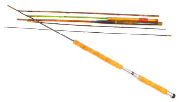 Three fishing rods, comprising a Milbro 1960s two piece solid fibre glass spinning rod, a 19thC thre