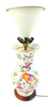 A late 19thC German porcelain vase, of bulbous form, with elongated neck and flared rim, decorated w