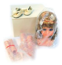 A Betty Collins porcelain kit doll, item number D10811K, boxed.