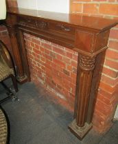 An oak fireplace surround, 121cm high, 156cm wide, 24cm deep.