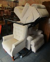 Two electric reclining armchairs, together with a further armchair. The upholstery in this lot does