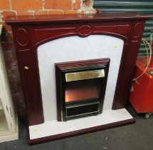 An electric fireplace and surround, 107cm high, 112cm wide.