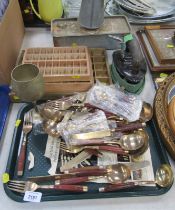 A quantity of Eastern rosewood handled brass flatware, together with a greenhouse heater iron, brass