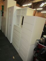 A large quantity of white painted and other bedroom furniture, to include six drawer chest, two beds