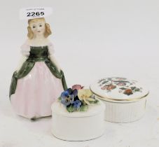 A Royal Doulton porcelain figure, modelled as Penny, HN2338, together with two porcelain trinket box