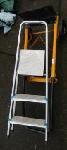 A sack barrow, together with an A frame metal step ladder. (2)