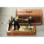 An oak cased Singer sewing machine, F1569606.