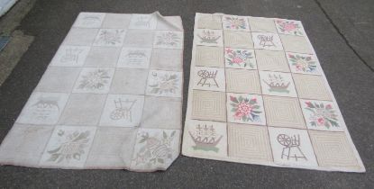 Two cream ground wool rugs, each decorated with differing squares depicting flowers, ships, etc.