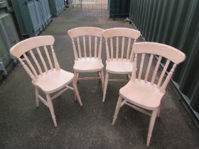 A set of four beech kitchen chairs. With the option of the next lot at the same price.