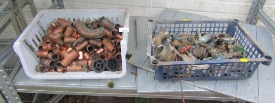 A quantity of brass and copper plumbing fittings.