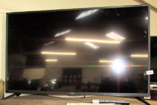 A Sharp Aquos 40" television, 40BJ5K, with lead and remote.