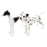 A Beswick pottery figure modelled as the Dalmatian Arnoldene, 16cm high (AF), together with an Old T