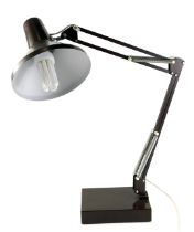 An Anglepoise type lamp, in brown and cream, on a rectangular base, the base 20cm wide.