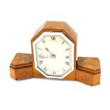 An unusual walnut veneered Art Deco mantel clock, of stepped form, with chrome plated mounts, 34cm w