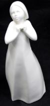 A Royal Doulton porcelain figure from the Images series modelled as Thankful, 24cm high.