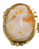 A 19thC shell cameo portrait brooch, the oval cameo set with maiden head in flowing robes, in a gold