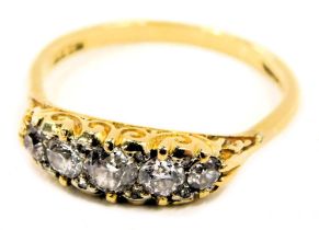 A Victorian five stone diamond ring, the marquise shaped ring head set with five round brilliant cut