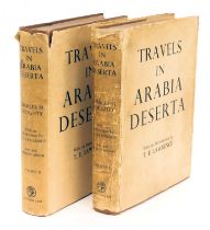 Doughty (Charles M.) TRAVELS IN ARABIA DESERTA 2 vol., 2 folding maps, publisher's cloth, dust-jacke