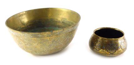 A Chinese gong shaped brass bowl, with a border of dragons, birds, etc., stamped China to underside