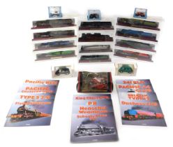A collection of Atlas Editions diecast locomotives, each with original packaging, a VW Golf, Polo, e