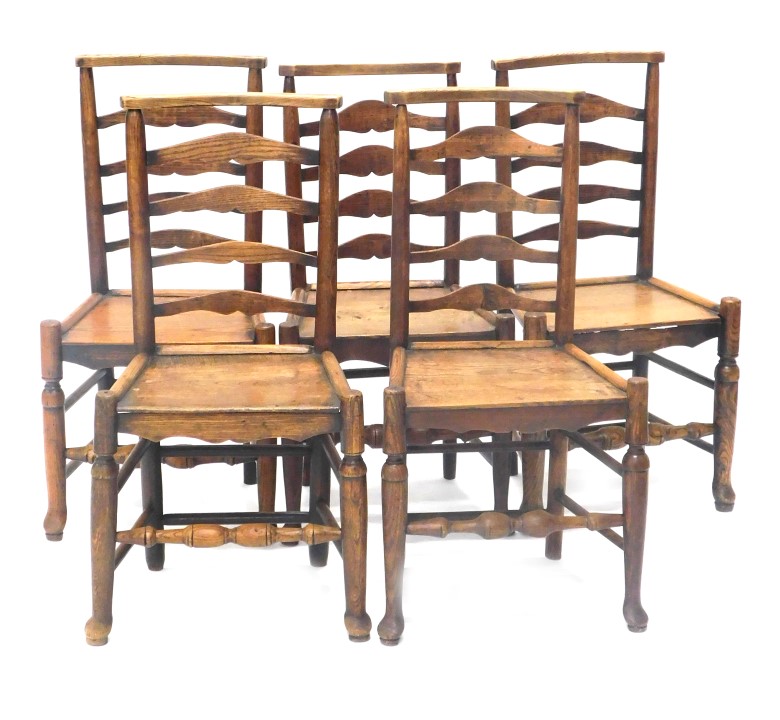 A set of five early 19thC ladder back dining chairs, with boarded seats.