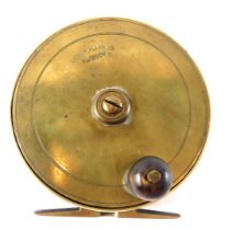 An Arthur Allan Limited of Glasgow brass fly fishing reel, with turned hardwood handle, 10cm diamete
