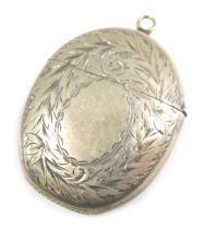 A silver plated oval shaped match case, with engine engraved decoration and match strike to base, 5c