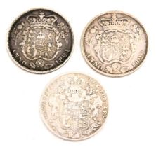 Three George III and later half crowns, comprising 1820, 1821 and 1825, 40.9g.