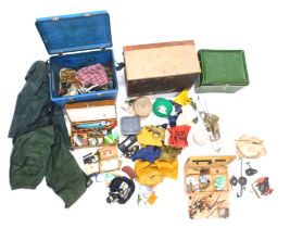 A fishing box containing a collection of fishing accessories, and two other similar boxes.