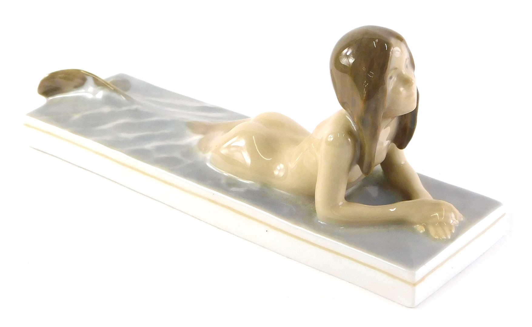 A Royal Copenhagen porcelain figure of a mermaid, printed and handwritten marks to underside, number