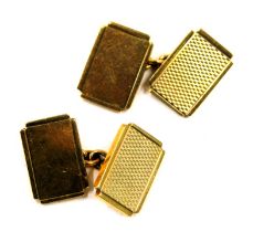 A pair of 9ct gold cufflinks, with rectangular panels each with engine turned decoration, 13.4g all