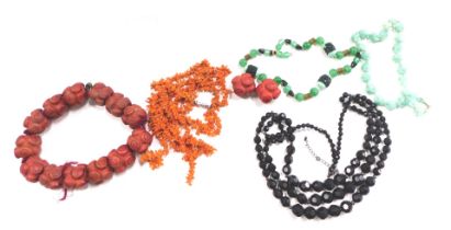 A group of fashion necklaces, comprising coral single strand necklace, jadeite beaded necklace, imit