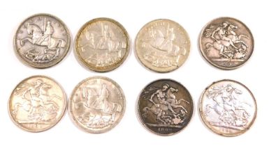 Eight silver collectors coins, comprising four George V silver crowns dated 1935, and four Victorian