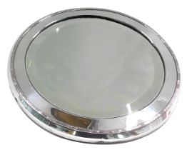 An Edward VII Mappin and Webb silver framed circular wall mirror, with a reeded outer border and bev