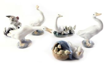 A group of Lladro porcelain figures, comprising a pair of geese, 10cm high, further birds, and a kit