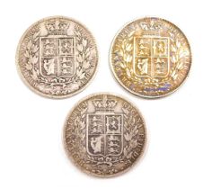 Three Victorian silver crowns, comprising 1882, 1885 and 1883, 41.5g all in. (3)