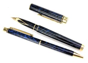 A cased Schaeffer pen set, comprising a blue and black marbled effect fountain pen and ballpoint set