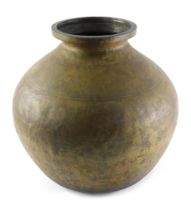 A large Indian globular brass vase, with inscribed band to border, 46cm high.
