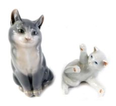 A Royal Copenhagen porcelain seated grey cat, 12cm high, and a white kitten.