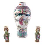A late 19th/early 20thC Chinese famille rose baluster shaped vase, decorated with figures, 26cm high