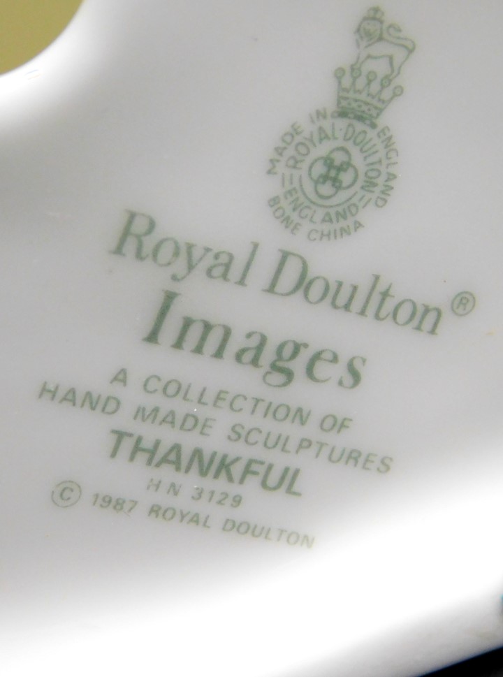 A Royal Doulton porcelain figure from the Images series modelled as Thankful, 24cm high. - Image 2 of 2